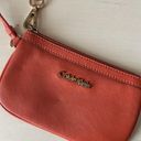 Calvin Klein leather orange wristlet with gold hardware Photo 3