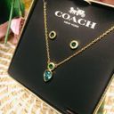 Coach  necklace and earrings set in emera…​​​​​​ Photo 2