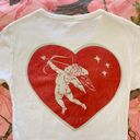 Urban Outfitters cupid heart “no mercy” “love don’t pay the bills” baby tee Photo 2