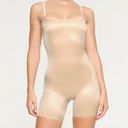 SKIMS  Barely There Low Back Mid Thigh Bodysuit Shapewear in Sand Size XS Photo 1