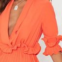 Pretty Little Thing s Orange Frill Pleater Skater Dress Photo 1