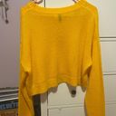 Divided Yellow Sweater Photo 1