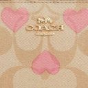 Coach Snap Wallet In Signature Canvas With Heart Print Photo 2