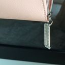 Dior Make up bag in light pink, zipper pull has the D logo Photo 7