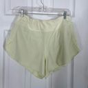 Athleta  Run With It 3.5” Running Shorts Size Medium Neon Yellow/Green Photo 1