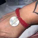 The Row Triple Red Beaded Stretch Love Charm Bracelet Photo 0