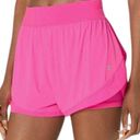 Sweaty Betty  Neon/ sonic pink athletic shorts.  Size small Photo 1