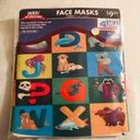 5/$25 Face Masks 2 pack new in package 1 pattern & 1 solid color made in the USA Photo 0