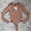 Naked Wardrobe Coco Deep V Long Sleeve Bodysuit Photo 0