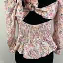 Francesca's  Cropped Floral Peplum Photo 6