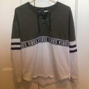 Justify Women’s size small Sweatshirt olive green and off white Photo 0