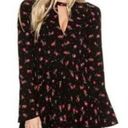 Free People Tegan mini dress black and red floral long sleeve with front and back cut out  Photo 0