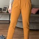 Soho Apparel Mustard yellow skinny leg high waisted pant with adjustable tie belt Photo 0