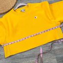 Champion  reverse weave yellow cropped crewneck sweatshirt Photo 1