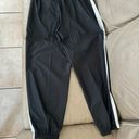 Nike Women's Sportswear Repel Essential Woven Jogger Pants Photo 12