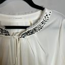 T Tahari 🌺 T. Tahari white embellished blouse Photo 1