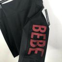 Bebe NEW  Sport Net Mesh Pocket Biker Shorts in Black/Hibiscus Women's Plus Sz 3X Photo 1