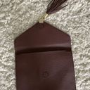 Big Buddha  envelope tassel Clutch Photo 1