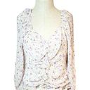 ASTR NWT  the Label Womens Floral Print Ruffle Zip Cropped Shirt Sz XL
Cottage Photo 0