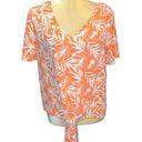 Nine Britton  cute new white tie front top with orange floral design. Photo 0