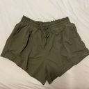 Target Women's High-Rise Shorts 4.25" - All in Motion™ Moss Green XL Photo 0