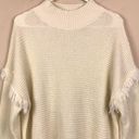 Umgee  Women’s Waffle Knit Fringe Sleeve Hem Detail Mock Neck Cream Sweater Photo 1