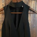 by the way. NWT black romper Low neck size XS Photo 1