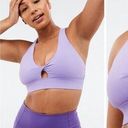 Fabletics NWT  Oasis Twist Sports Bra Size Large Purple Photo 1