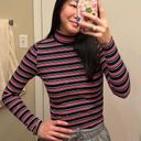 About Us Revolve  Striped Turtleneck Photo 3