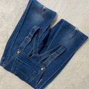 Blue Jean distressed Overalls Size Small. Photo 0