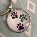 Puppy Keychain NWOT. Paw prints, dog house, dog, name tag and food dish charms. Photo 2