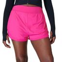 Sweaty Betty  Neon/ sonic pink athletic shorts.  Size small Photo 7