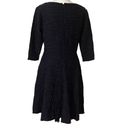 Donna Morgan  Fit & Flare Dress. Size 6. Black  Textured Photo 1