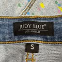 Judy Blue  paint slash distressed shorts in a size small Photo 2