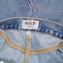 AGOLDE  light wash distressed frayed festival denim button fly mini skirt size 27 Photo 5