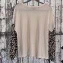 Discreet Cream waffle knit with cheetah sleeves top Photo 4