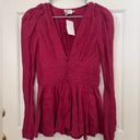 Rebellion Aje  Tucked Peplum V-Neck Long Sleeve Corset Top in Magenta Photo 2