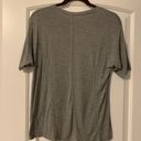 Sweaty Betty  ladies athletic shirt.  Size: XS.  Hi Lo hem. Photo 3