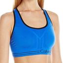 Calvin Klein Blue and black reversible sports bra never worn Photo 0