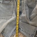 Lee y2k vintage  denim shirts, fits women’s M/L, apx size 8/10, has stretch band waist that is elastic, 14.5” band laying flat but can stretch quite a bit, 5” inseam beautifully distressed Photo 5