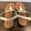 Tommy Hilfiger  thong white gold sandal, size 8 ￼ Photo 6