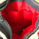 Avon red and navy nautical canvas tote bag with a zipper closure and interior pockets and an outer pocket Photo 2