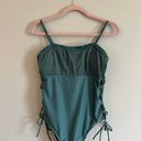 One Piece Green Swim Suit With Side Cut Outs Photo 1