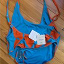 Fabletics  new blue and orange cheeky bathing suit size large Photo 4