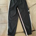 Nike Women's Sportswear Repel Essential Woven Jogger Pants Photo 7