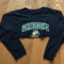 Oregon Ducks Long Sleeve Crop Top Black Photo 0