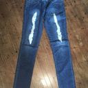 Bebe  distressed shimmery patch size 27 skinny jeans Photo 0