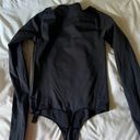 SKIMS bodysuit raw edge Photo 1