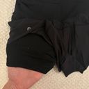 Lululemon size 2 high waisted limited edition flowey shorts with spandex under Photo 4