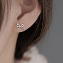 Boutique Silver Bow Stud Earrings Photo 1